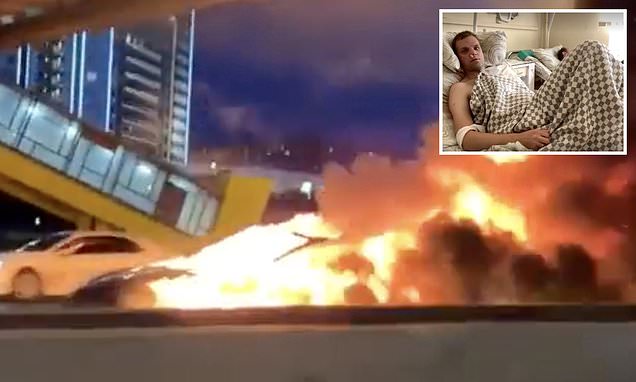 Shocking moment a Tesla EXPLODES after 'autopilot failure' saw driver plough into a tow truck in Moscow