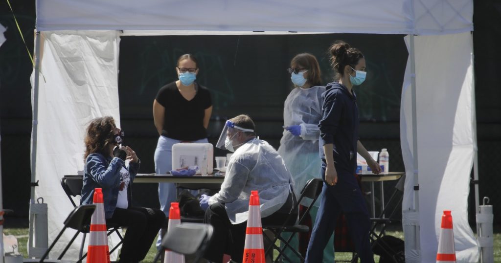 US passes South Korea in virus testing as Trump unveils expanded effort