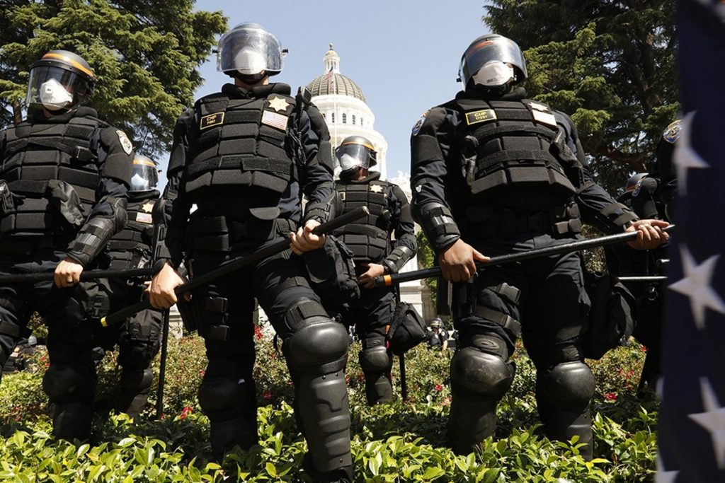FEDERAL GOVERNMENT BUYS RIOT GEAR, INCREASES SECURITY FUNDING, CITING CORONAVIRUS PANDEMIC