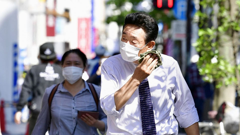 Fears grow over heat exhaustion caused by wearing masks in summer