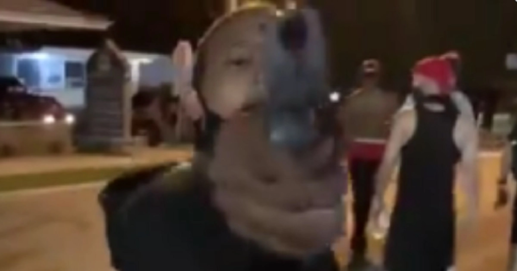 Unhinged Man Points Weapon in Face of Conservative Reporter During Riot