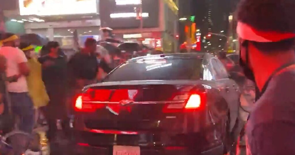 VIDEO: Motorist Drives Through Black Lives Matter Protesters Blocking Road in Times Square