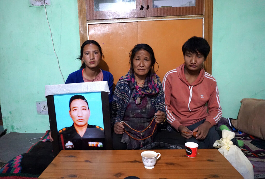 The family of Tibetan soldier, Nyima Tenzin, who died from a landmine blast on Aug. 29-30, in their home in a Tibetan refugee camp in Leh on Oct. 9, 2020. (Venus Upadhayaya/Epoch Times)