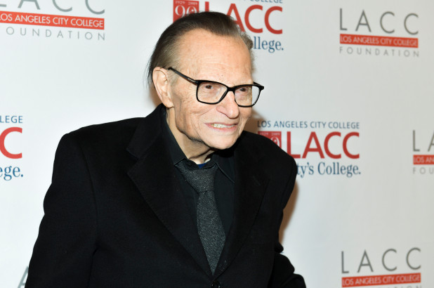 Larry King hospitalized with COVID-19