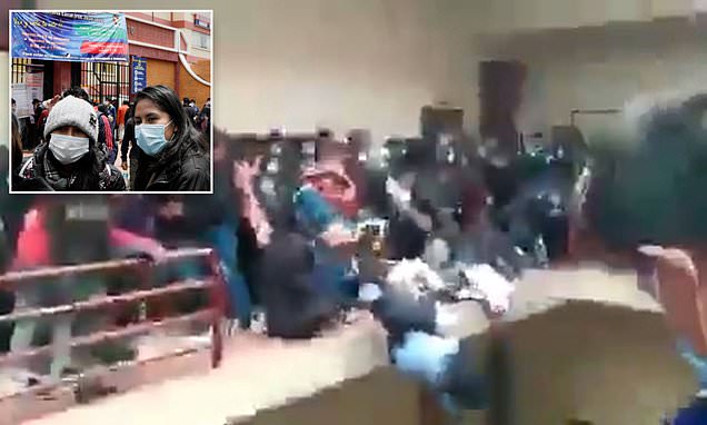 Seven university students are killed and four more are injured after falling from fourth floor balcony when railing collapsed in crush outside of lecture hall in Bolivia