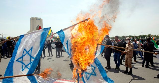 WATCH: Man in Iran Catches Fire While Trying to Burn Israeli Flag