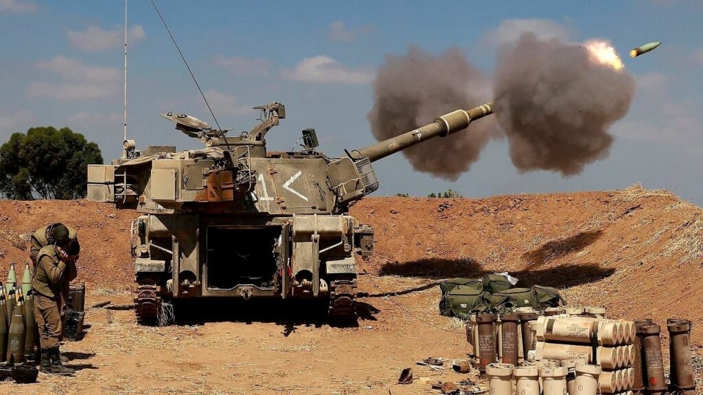 Israel masses troops along Gaza border amid rocket fire