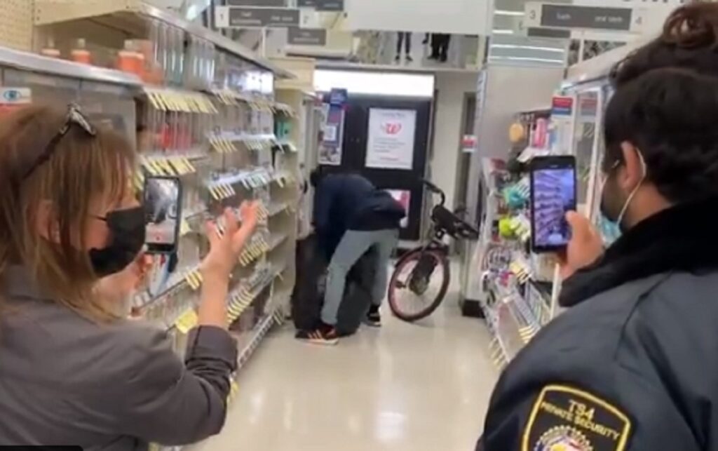 SHOCKING VIDEO: Thief Rides Bike Into San Francisco Walgreens, Fills Trash Bag With Goods — Security Watches and Films