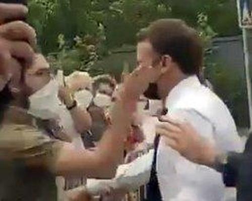 Watch: French President Slapped In Face By Man Shouting "Down With Macron!"