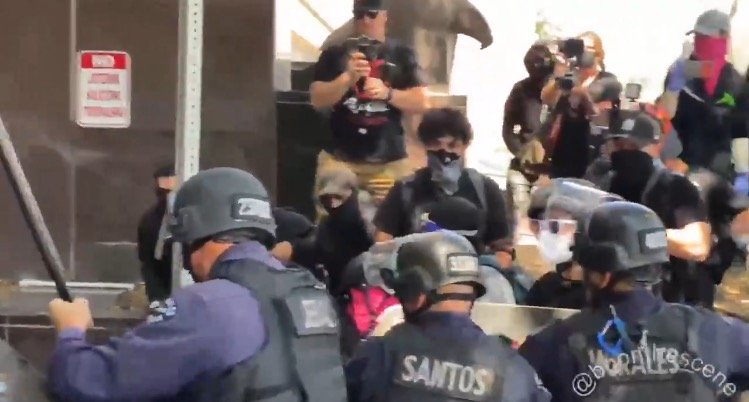 Police Beat Antifa Terrorists with Batons Outside Wi Spa in Los Angeles, Declare Unlawful Assembly (VIDEO)