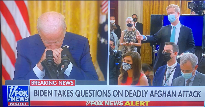 Biden Bizarrely Buries His Head in His Hands During Back and Forth With Peter Doocy