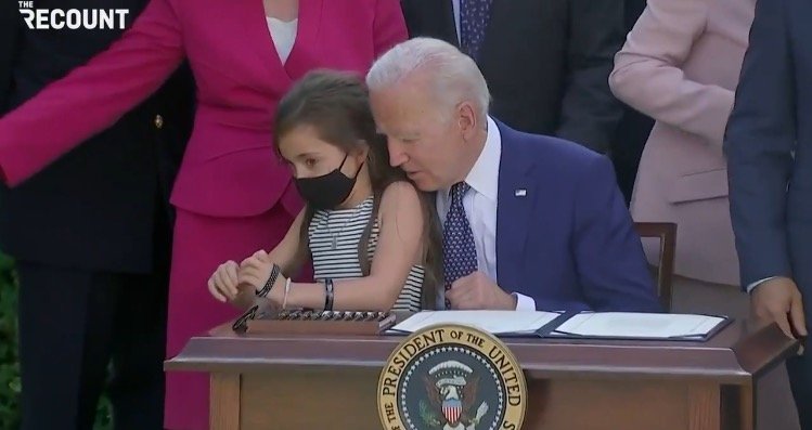 Joe Biden Grabs Little Girl, Whispers in Her Ear During Bill Signing at White House (VIDEO)