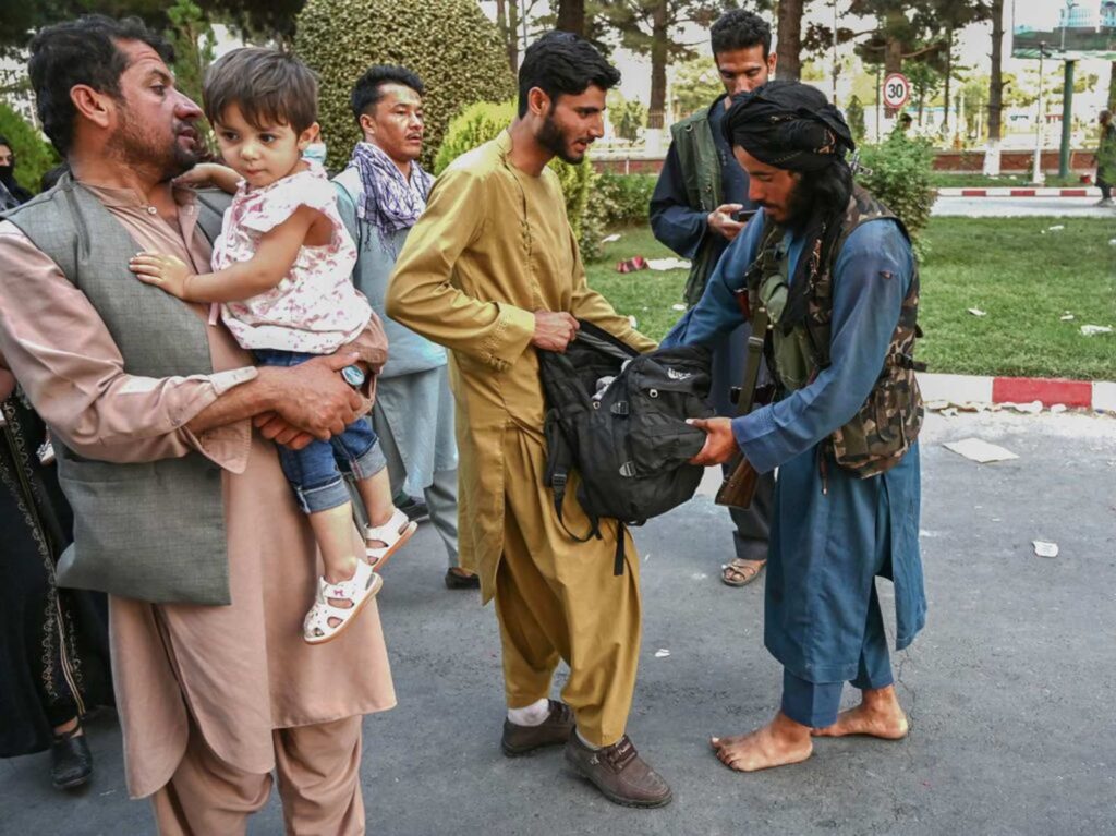 Taliban now says they’ll let Americans, Afghans leave after beating, blocking evacuees