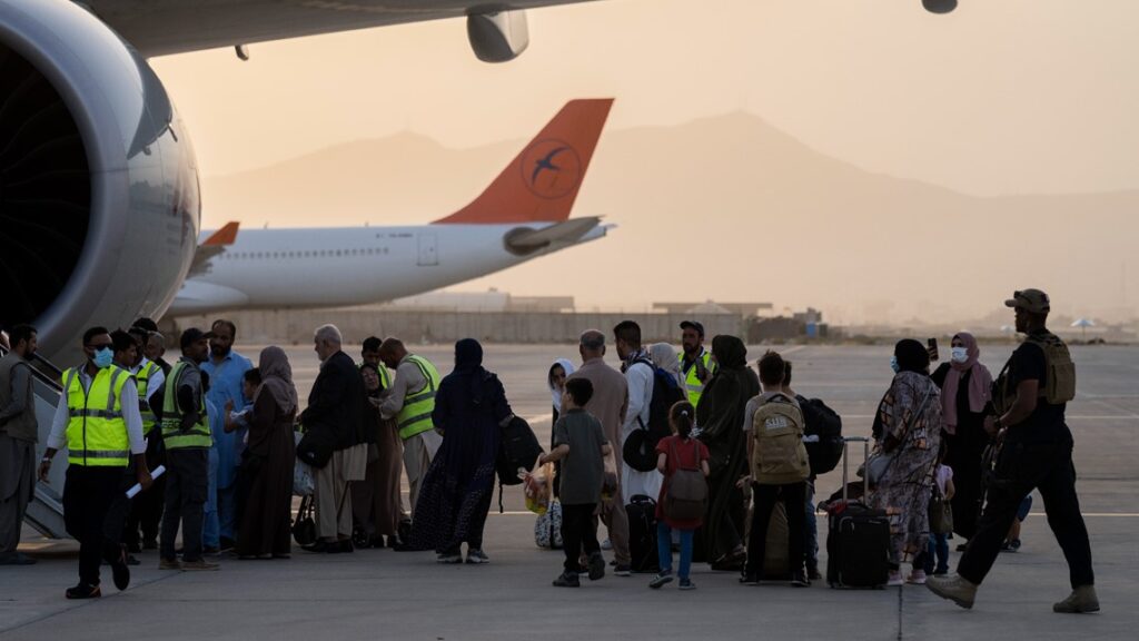 About 200 Westerners, including Americans, fly out of Kabul