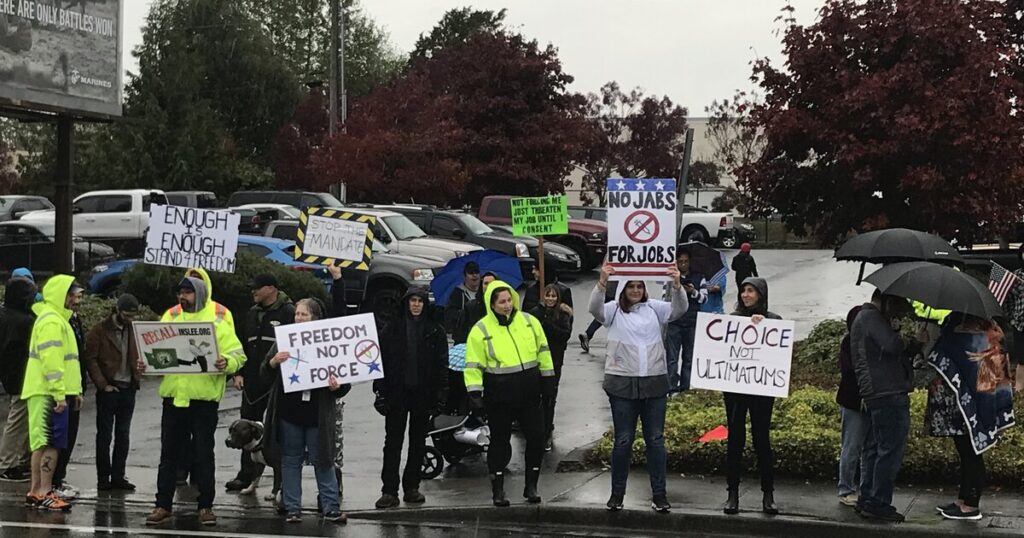 Workers protest angrily near Boeing’s Everett plant against vaccination mandate