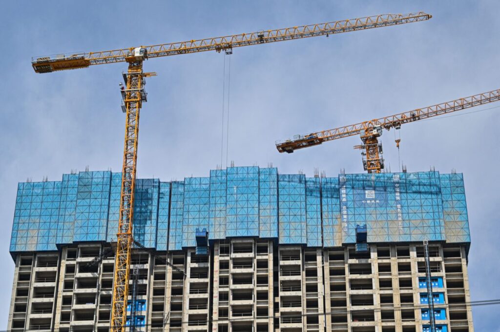 China to Roll out Property Tax in Bid to Tame Surging Prices