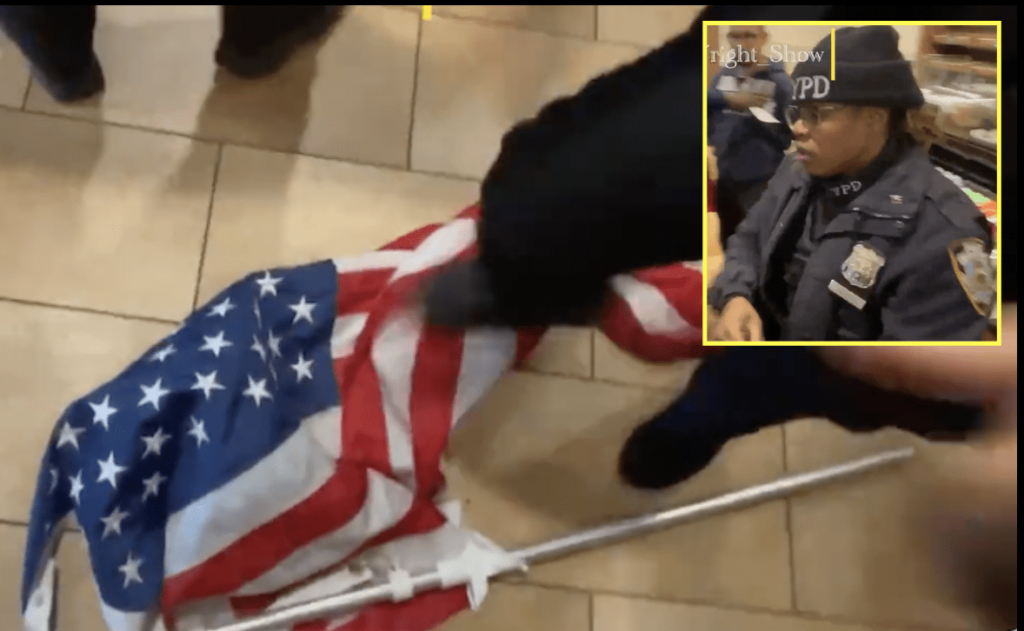 WATCH: Female NYPD Officer Rips US Flag From Army Veteran Protesting Vax Mandates, Throws it On Ground and Purposefully Steps On It