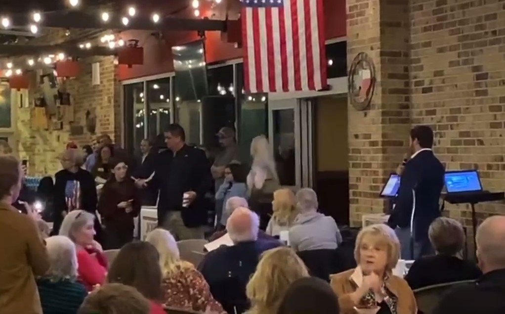 Watch: Dan Crenshaw Snaps at Young Girl at Fundraiser — Crowd Starts Yelling and Chanting Let’s Go Brandon, Call Him a Moron (VIDEO)