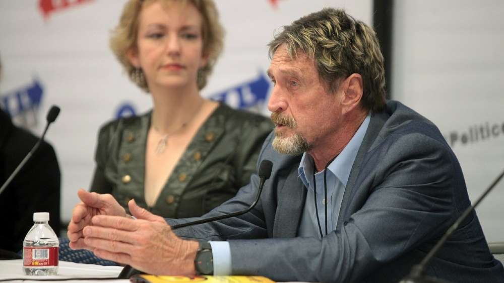 Wife Claims ‘Cover up’ as Judge Rules John McAfee Died by Suicide and Still Holds Body — After 8 Months