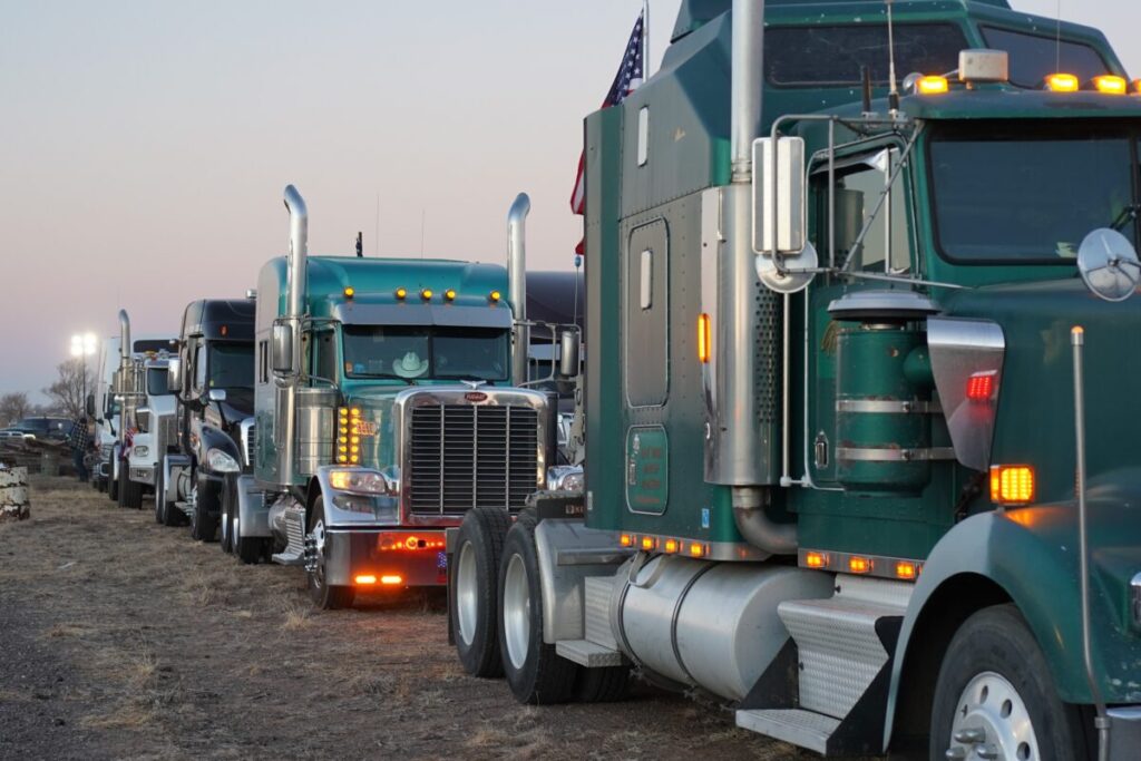 US Trucker Convoy Swells as It Moves Across Country to DC