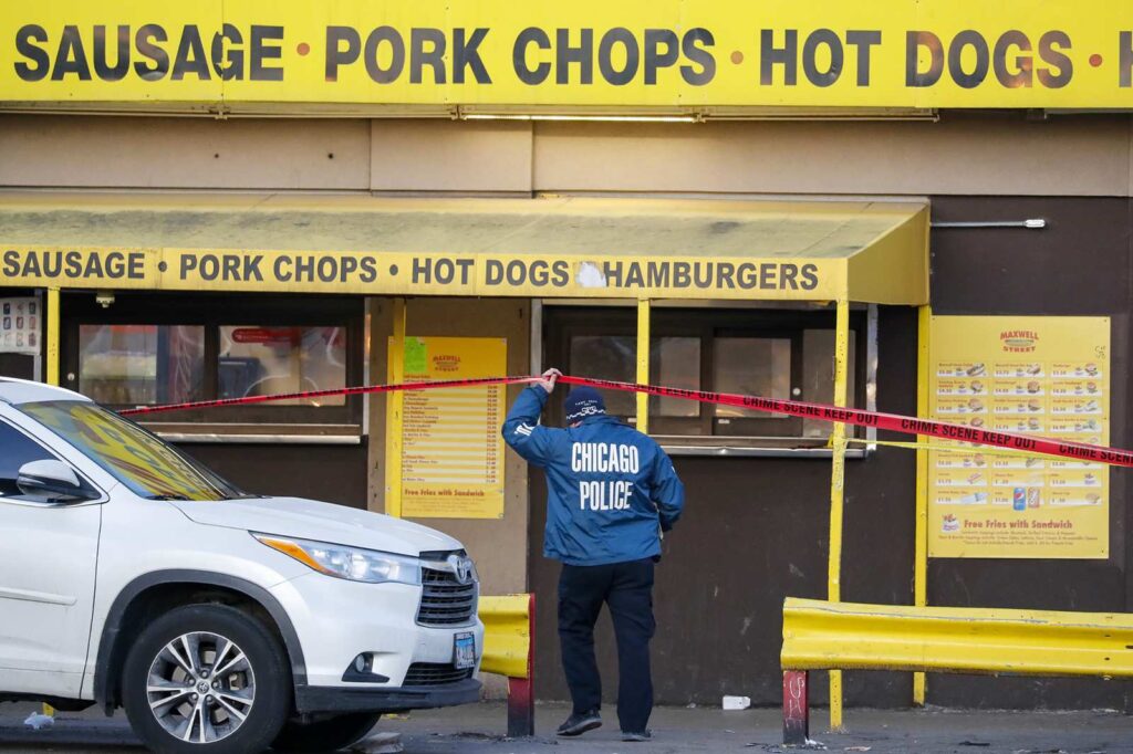 ‘10-1! 10-1! I got shot in the head!’ screams 1 of 2 cops shot while in line at hot dog stand in Chicago