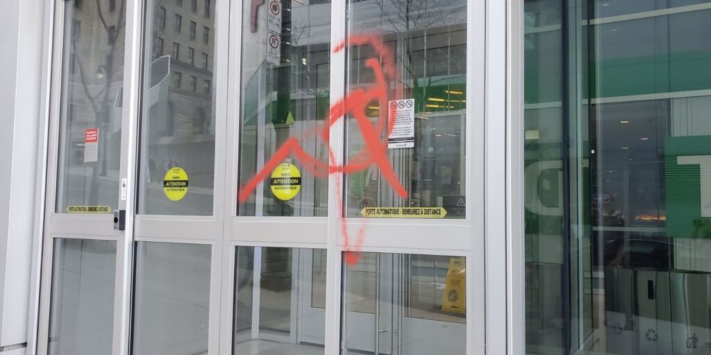 Communist protestors smash windows in downtown Montreal