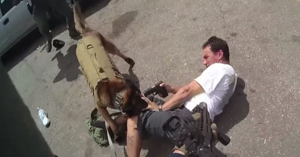 Punk Points Pistol at Police Dog's Head; Rifle-Armed K-9 Handler Doesn't Give Him a Chance to Pull the Trigger