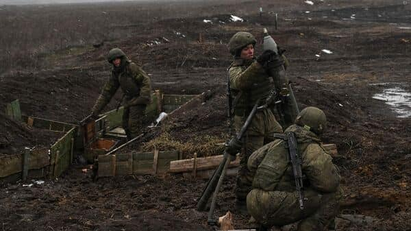 Russia pulls out troops after Ukraine encircles key city