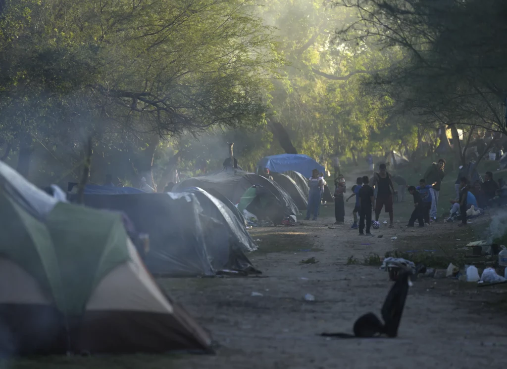 Migrants near US border face cold wait for key asylum ruling