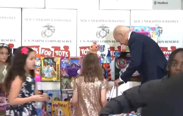 Biden Walks Around Aimlessly, Tries Riding Children’s Bike During Toys for Tots Event