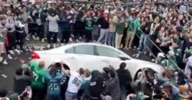 WATCH: Philadelphia Eagles Fans Flip Car Before Super Bowl Even Starts