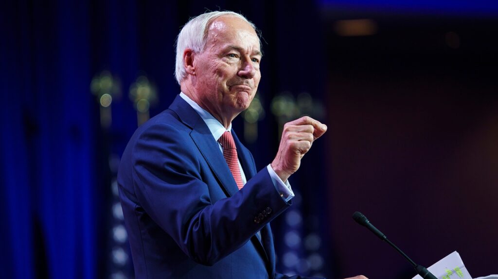 Turning Point attendees meet Asa Hutchinson with boos, chants of ‘Trump’
