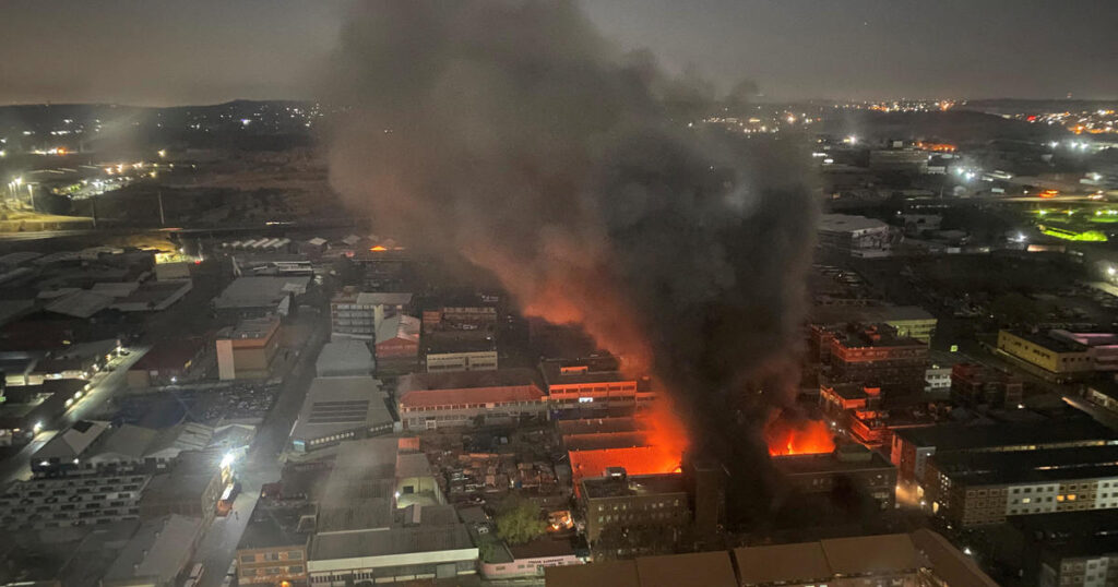 Dozens killed in South Africa as fire guts building many homeless people had moved into