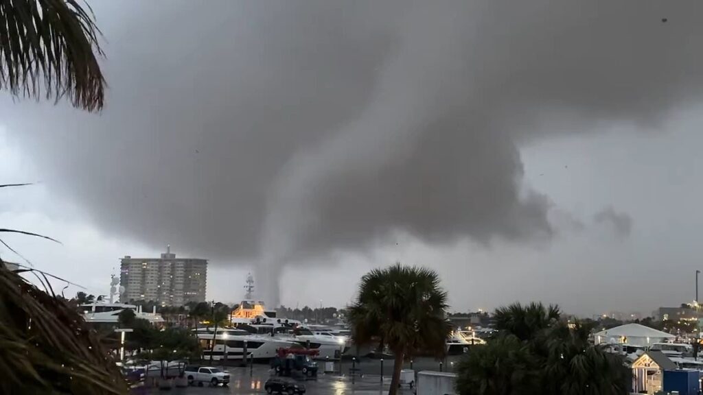 Terrifying moment TORNADO touches down in Ft. Lauderdale, causing explosions as the funnel cloud rips through South Florida