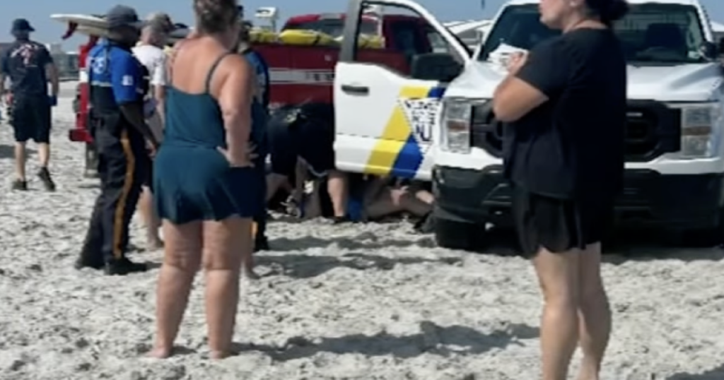 Woman Sunbathing On Beach Ran Over By Police Cruiser