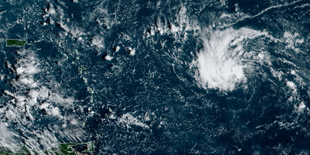 Invest 94L could develop into tropical depression while forecasters continue tracking Caribbean disturbance