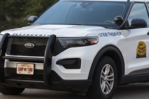 Near the scene of Kirk's death, two men tried to plant a bomb under a car.