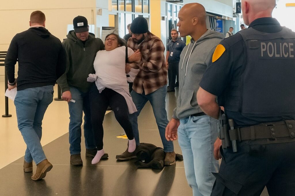 Illegal migrant mom resists ICE by screaming and flailing in airport; Left claims she’s a US citizen. She’s not.