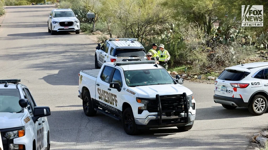 Pima County Sheriff’s Department patrol vehicle parked along a desert roadway in Arizona during daylight.