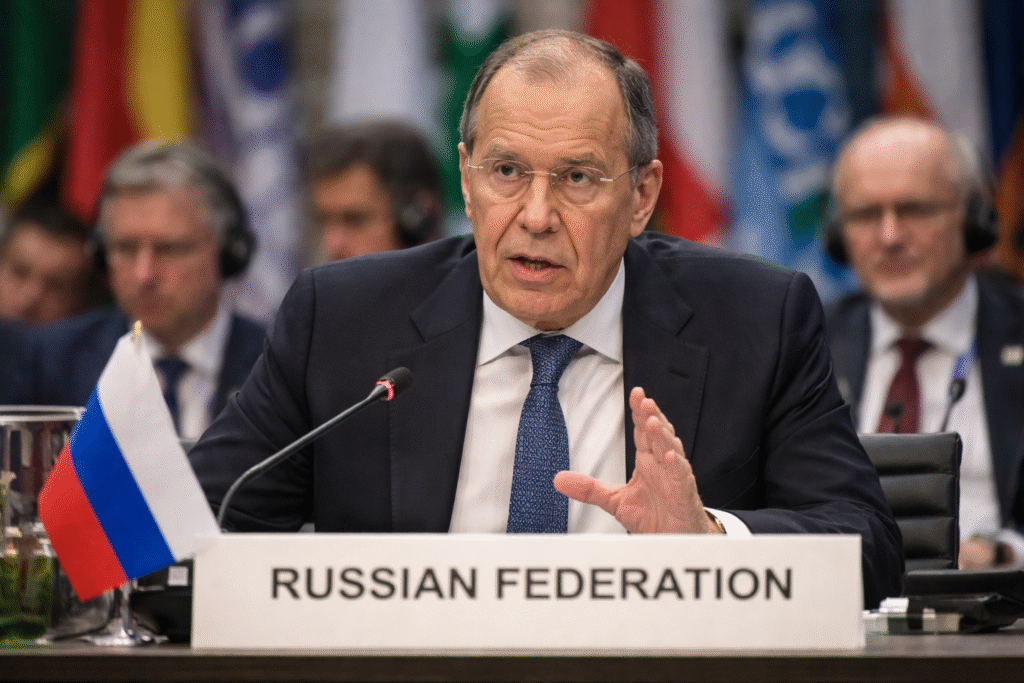 Russian Foreign Minister Sergey Lavrov speaking at an international diplomatic meeting, illustrating his criticisms of multilateral forums like the OSCE.