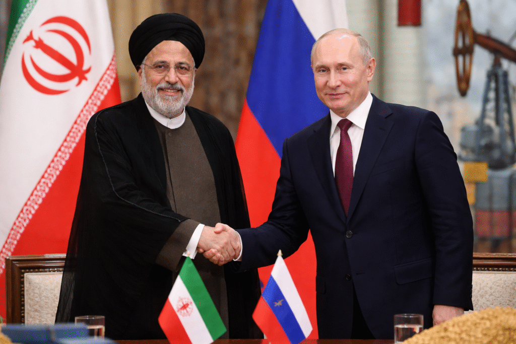 Iranian and Russian leaders shaking hands in front of their national flags during a diplomatic meeting symbolizing expanding trade cooperation.