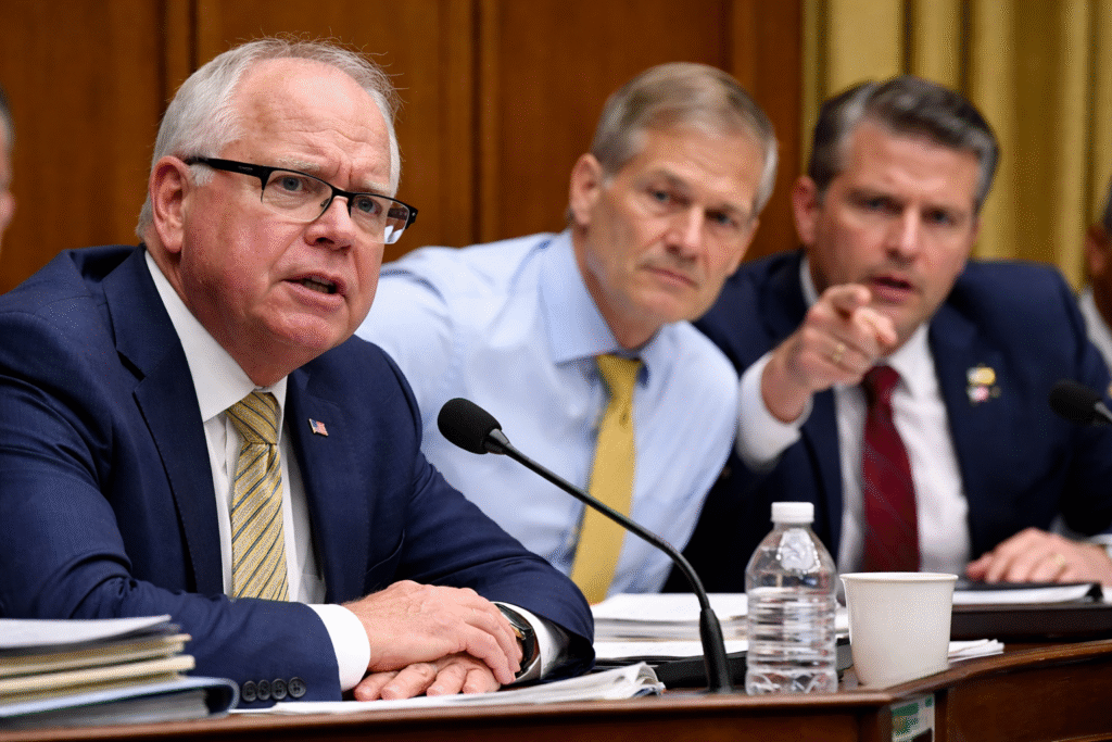 Minnesota Governor Tim Walz testifying at a congressional hearing while lawmakers question him about Minnesota’s social services fraud scandal.